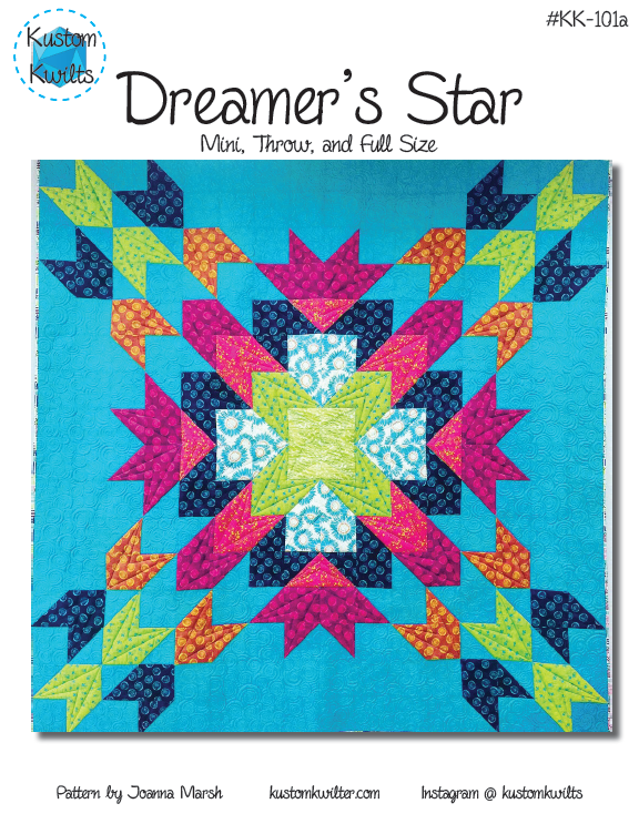 A quilt with the words dreamer 's star on it.