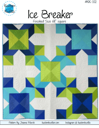 A quilt that is made of different colored squares.
