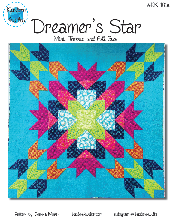 A quilt with the words dreamer 's star on it.