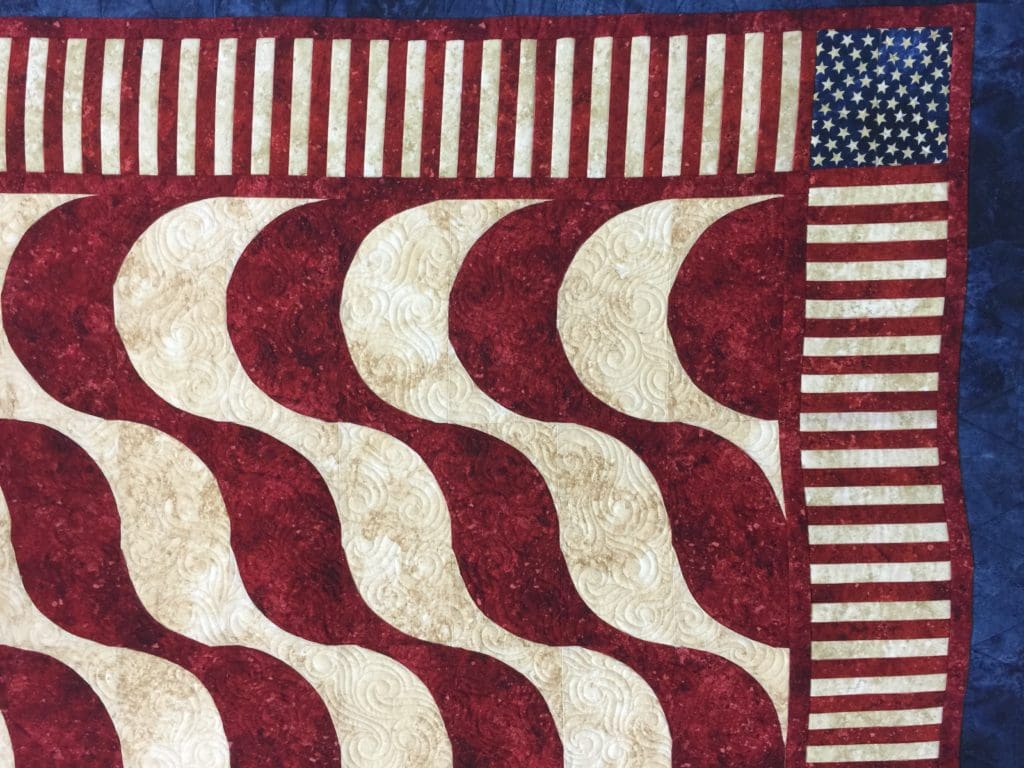 A close up of the quilt pattern