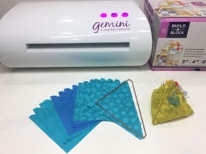 A table with some papers and a paper cutter