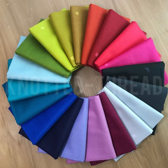 A circle of different colors on top of each other.