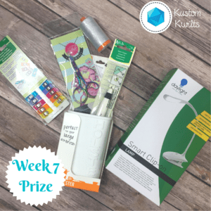 A table with some craft supplies and a toothbrush