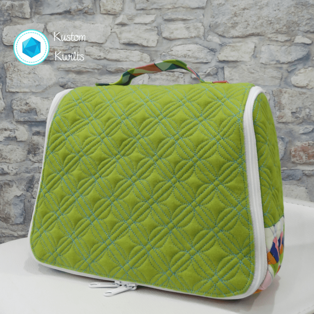 A green bag sitting on top of a table.