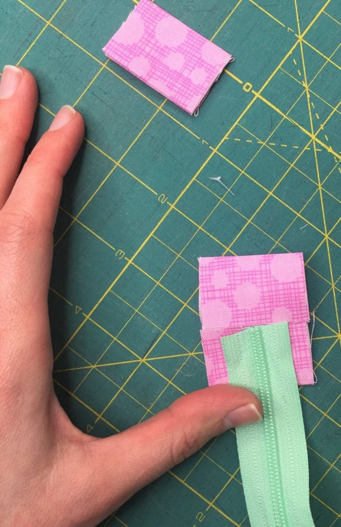 A heart shaped fabric with flowers and polka dots.