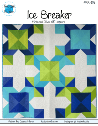 A quilt that is made of blue and green squares.