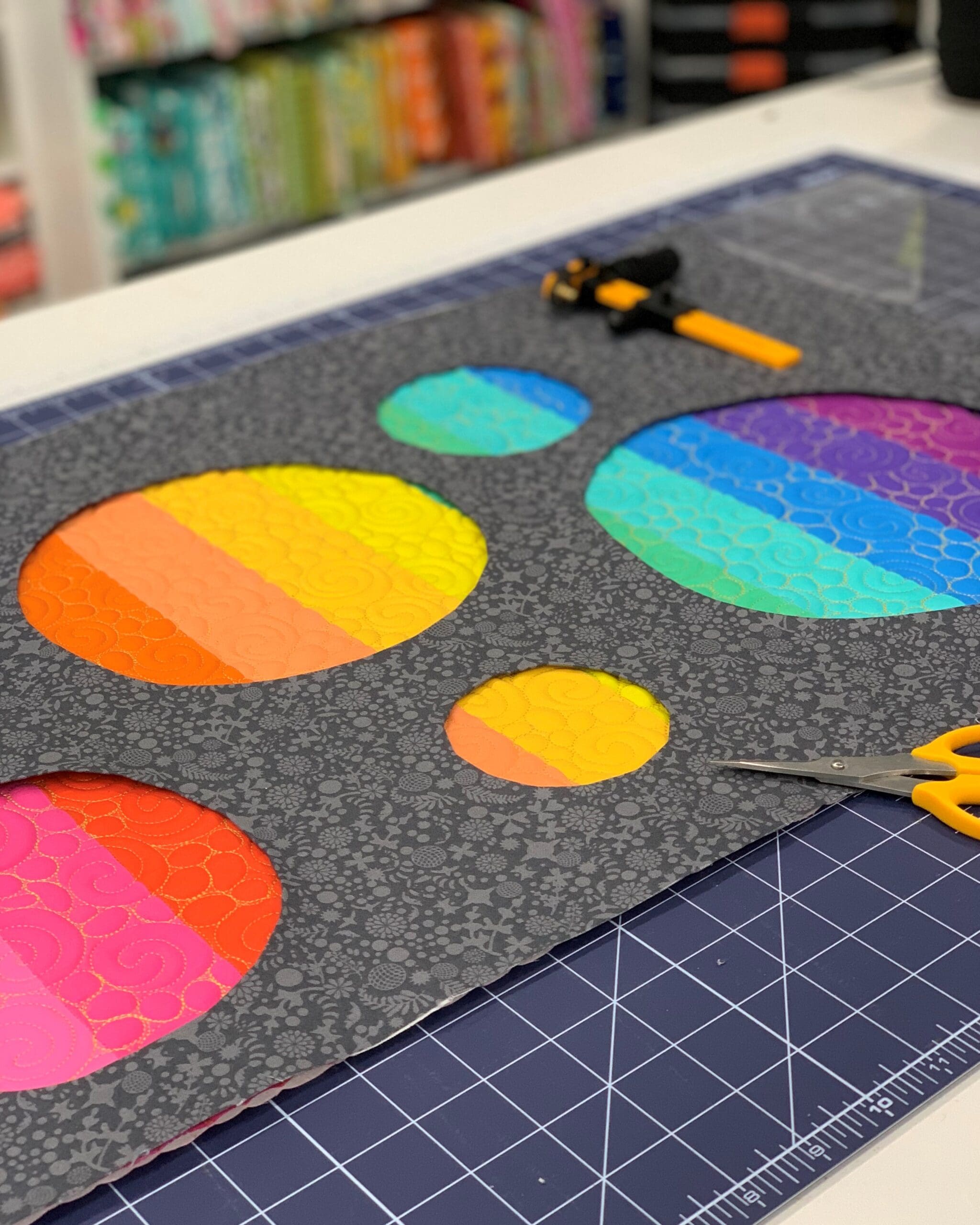 A cutting board with some cut out circles on it