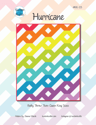 A quilt pattern with different colored squares on it.