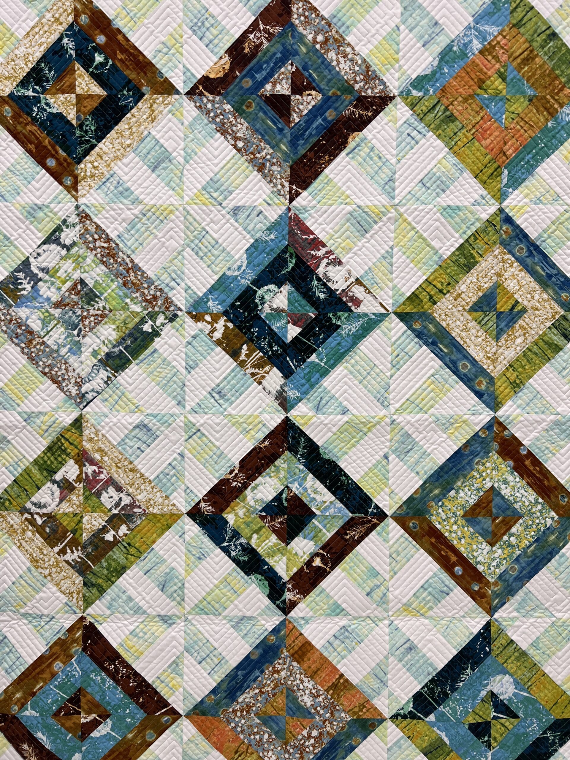 A close up of the quilt pattern