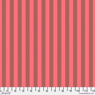 A pink and brown striped fabric background.