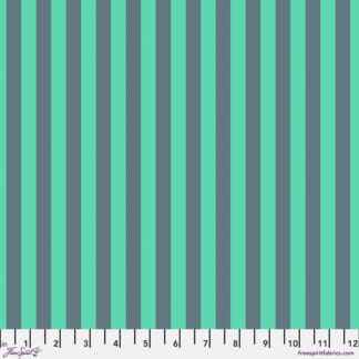 A green and grey striped fabric background.