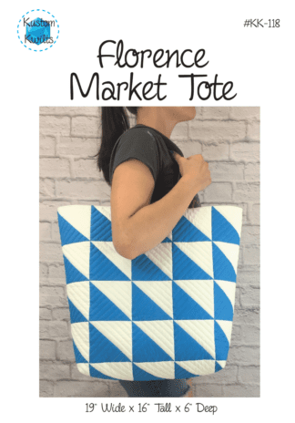 A woman holding onto a blue and white bag