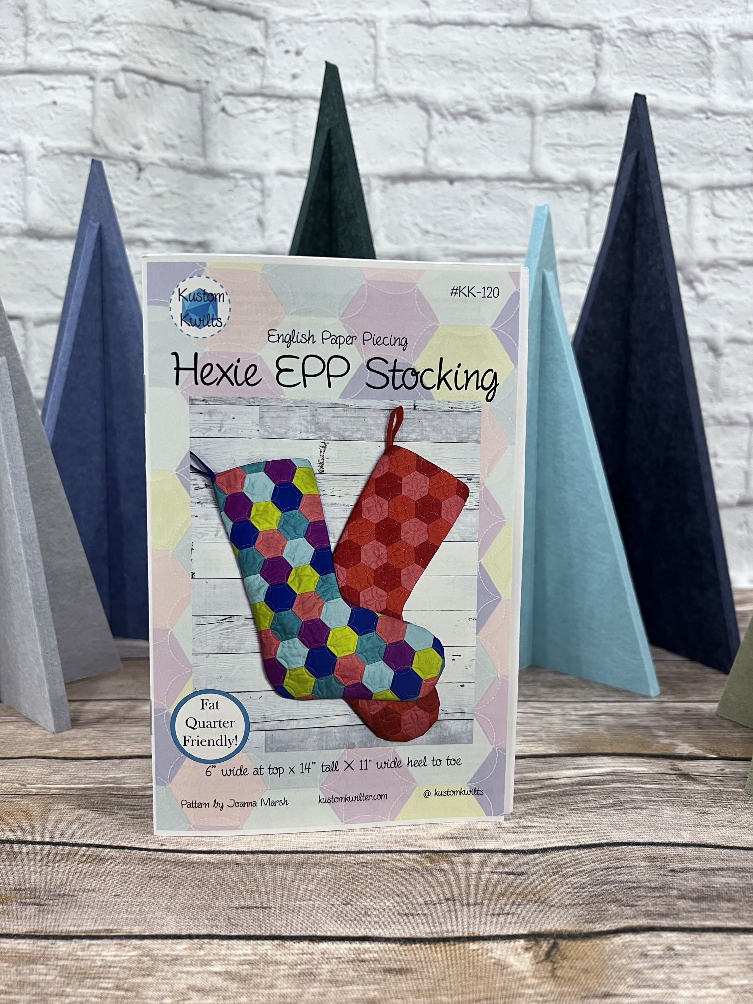 A colorful stocking sitting on top of a table.