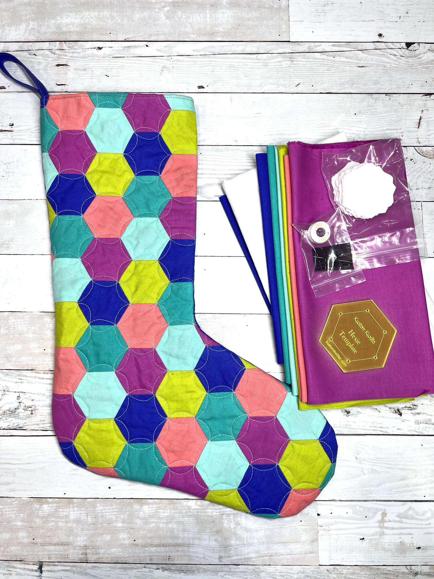 A colorful stocking with hexagons on it.