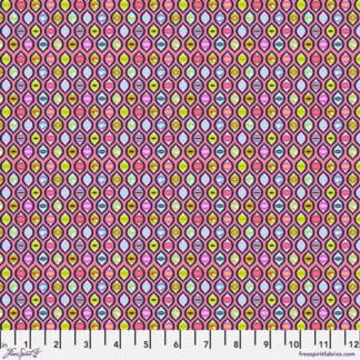 A pink and yellow pattern with many circles.